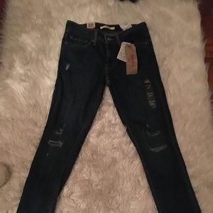 Distressed Levi's skinny jeans